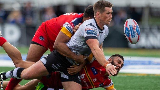 Toronto Wolfpack full-back Matty Russell is tackled