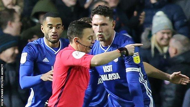 Seam Morrison makes a point to referee Tony Harrington