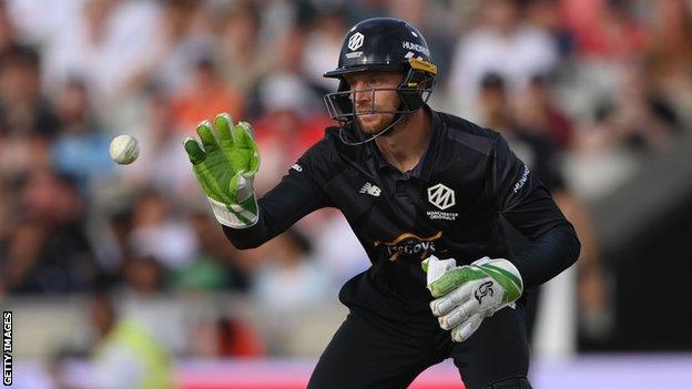 Jos Buttler takes a throw from the deep while playing for Manchester Originals in The Hundred