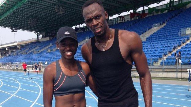 American student Candace Hill (left) and 100m men's world record holder Usain Bolt