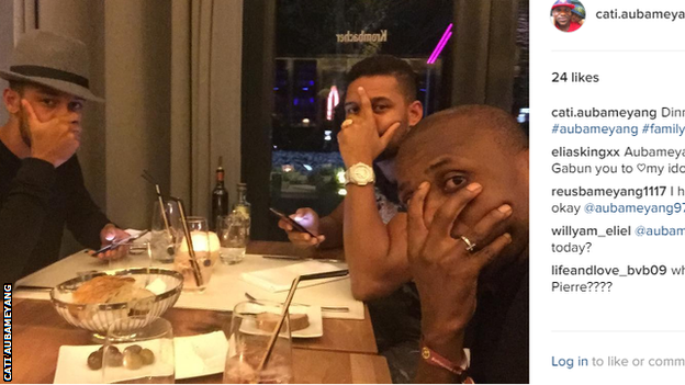 Pierre-Emerick Aubameyang (left) was pictured at a restaurant with his brother before kick-off