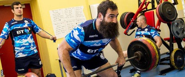 Josh Strauss of Scotland trains in the gym