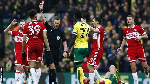 Referee Mike Jones shows Middlesbrough striker Rudy Gestede a straight red card