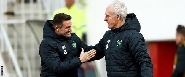 Robbie Keane and Mick McCarthy celebrate Jeff Hendrick's goal