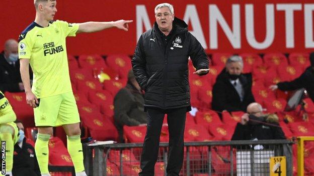 Steve Bruce looking on at Old Trafford