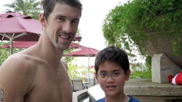 Michael Phelps with a 13-year-old Joseph Schooling - pictured eight years ago