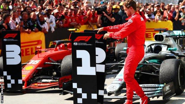 Sebastian Vettel moves the number boards at the Canadian GP