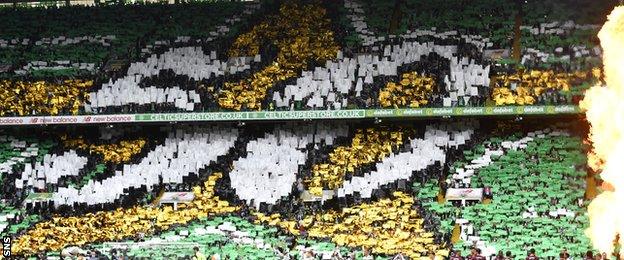 Celtic's supporters unveil flags bearing the number '50' to celebrate the anniversary of the Lisbon Lions' European Cup win