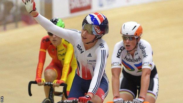 Britain's Laura Trott celebrates winning the women's scratch race