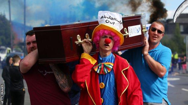 Oldham Athletic fans carried a mock coffin outside Boundary Park prior to kick-off in Saturday's match against Hartlepool United