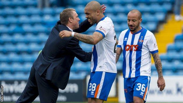 Lee Clark congratulates striker Josh Magennis after the win over St Johnstone