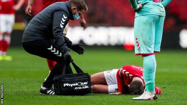 Andreas Weimann injured during Bristol City's match against Swansea City