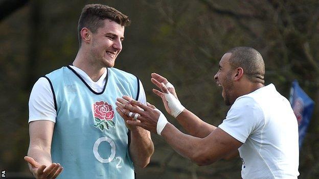 Ollie Devoto (left) shares a joke with England's hat-trick man from Rome, Jonathan Joseph