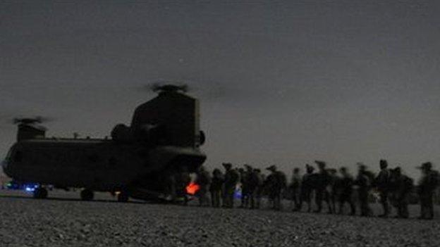 US and Afghan security forces board a Chinook helicopter in Kandahar province southern Afghanistan - 14 August 2011