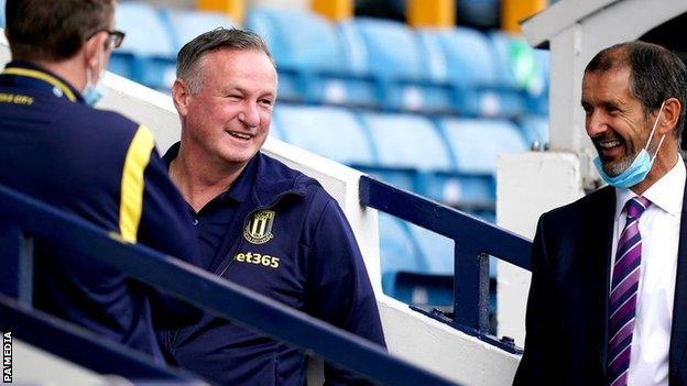 Michael O'Neill was the sixth new Stoke manager appointed by Tony Scholes (right) when he took the job in November 2019