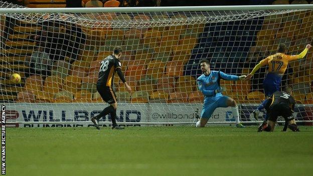 Alfie Potter fires-in Mansfield's second goal after just nine minutes