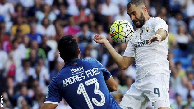 Karim Benzema scores Real Madrid's winning goal against Granada