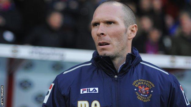 Michael Appleton looks on