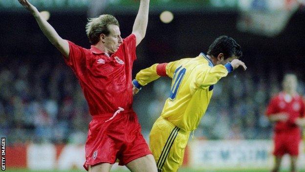 Georghe Hagi of Romania against Wales' Paul Bodin