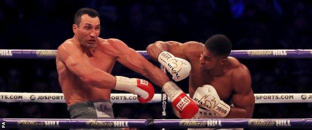 Anthony Joshua (right) lands a punch on Wladimir Klitschko