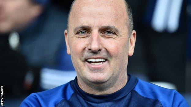 Paul Cook watches on