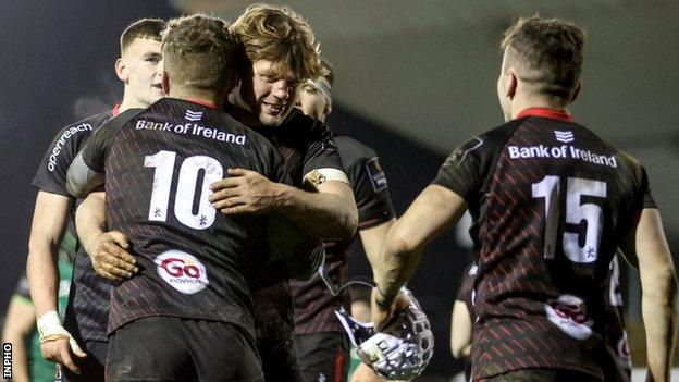 Ian Madigan and Jordi Murphy celebrate