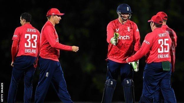 The England Learning Disability team celebrating a wicket