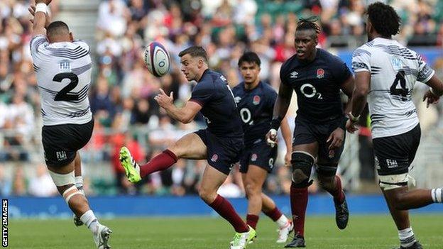 George Ford kicking the ball against Fiji