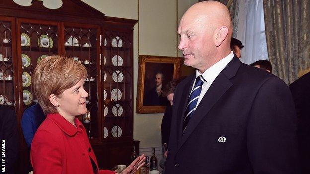 Scotland's First Minister Nicola Sturgeon talks with coach Vern Cotter at Bute House in Edinburgh in January 2016