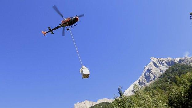 Helicopter transporting ice core samples
