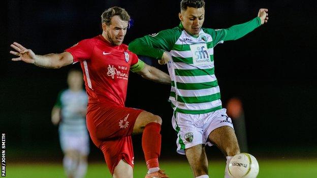 Connah's Quay Nomads' Callum Morris in action against New Saints' Dean Ebbe