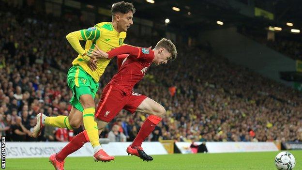 Conor Bradley battles with Norwich's Dimitris Giannoulis in Tuesday's game