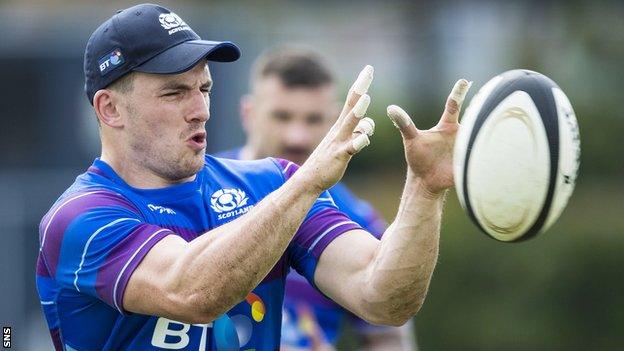 Matt Scott catches the ball during Scotland training