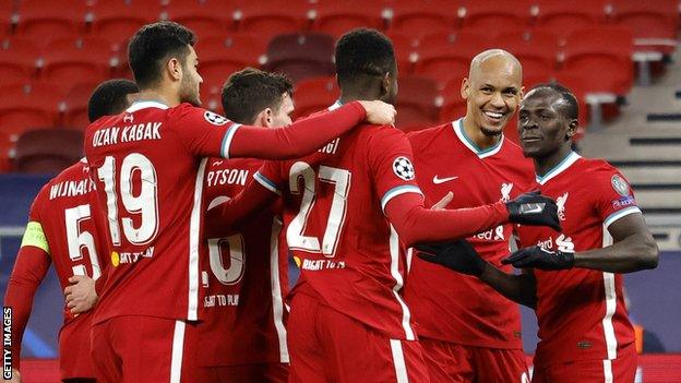 Fabinho (second from right) celebrates with Liverpool team-mates