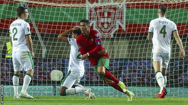 Cristiano Ronaldo celebrates after scoring his winner against the Republic of Ireland in Faro in September