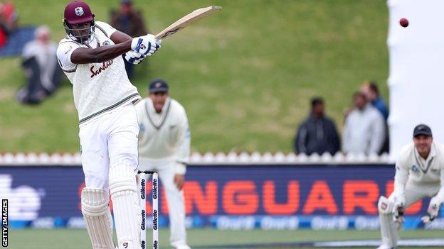 Jason Holder hits the ball