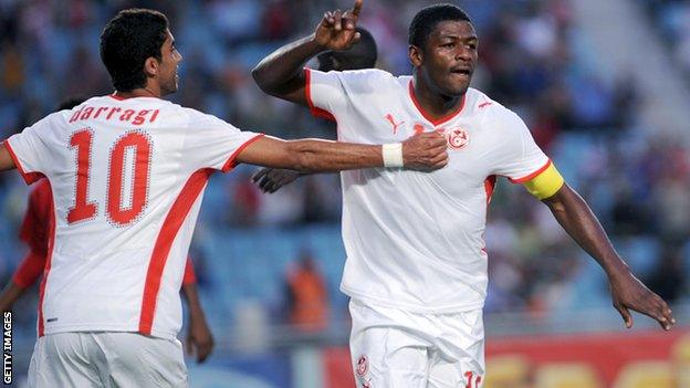 Radhi Jaidi celebrates a goal for Tunisia