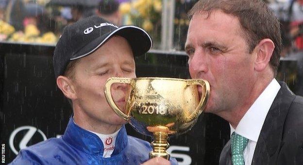 Winning jockey Kerrin McEvoy and trainer Charlie Appleby after Cross Counter's Melbourne Cup win