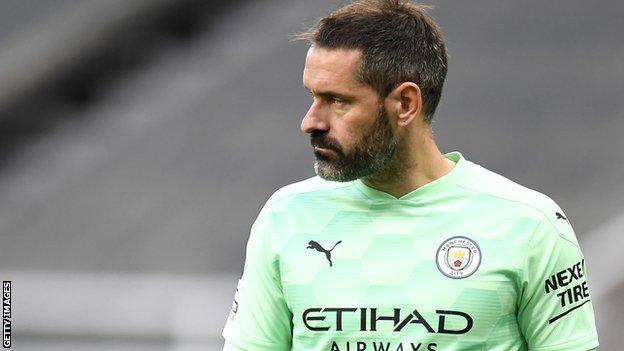 Scott Carson in action for Manchester City