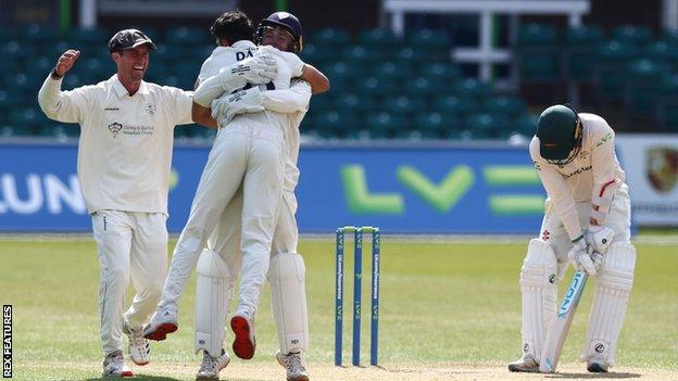 Derbyshire celebrate a wicket