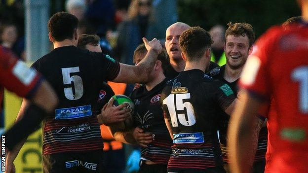 Cornish Pirates celebrate Tom Kessell's bonus-point try