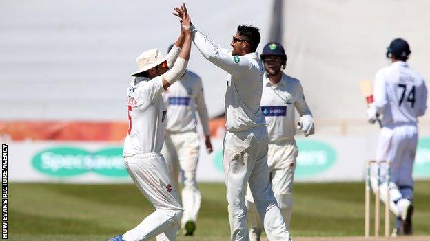 Prem Sisodiya of Glamorgan celebrates after bowling out Duanne Olivier