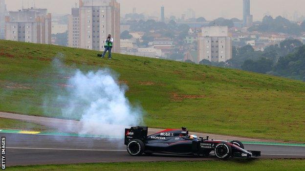 Fernando Alonso's McLaren breaks down during qualifying for the 2015 Brazilian Grand Prix