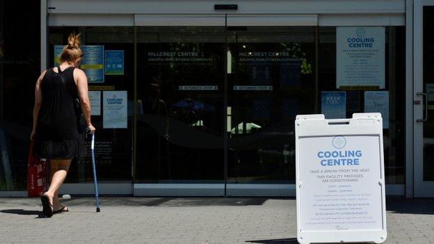 Woman walking into cooling centre