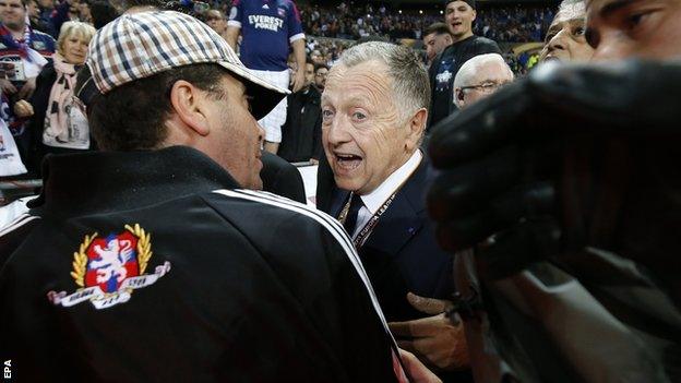 Lyon President Jean Michel Aulas spoke with supporters to calm matters