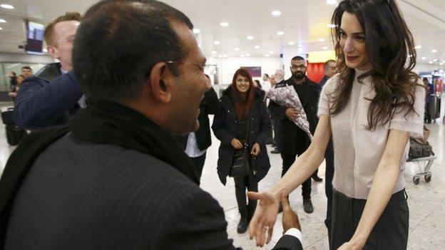 Amal Clooney greets Mohamed Nasheed at Heathrow airport, 21 January 2016