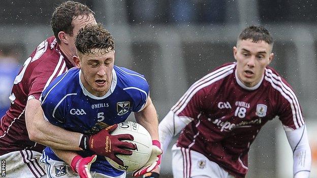 Cavan’s Ciaran Brady in action against Gary Sice and Eamon Brannigan of Galway