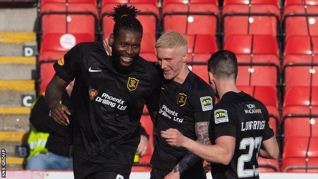 The Livingston striker (left) was deployed as a wide target man and caused Aberdeen lots of problems, scoring a fine opening goal as well as calmy converting both penalties