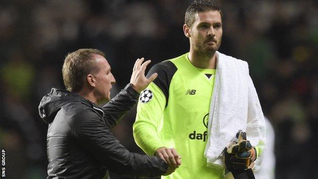 Craig Gordon is congratulated by manager Brendan Rodgers