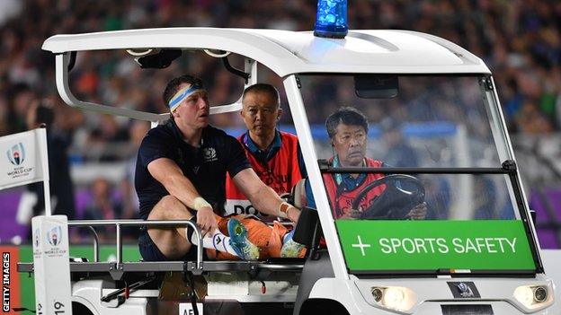 Scotland flanker Hamish Watson is driven off from field injured